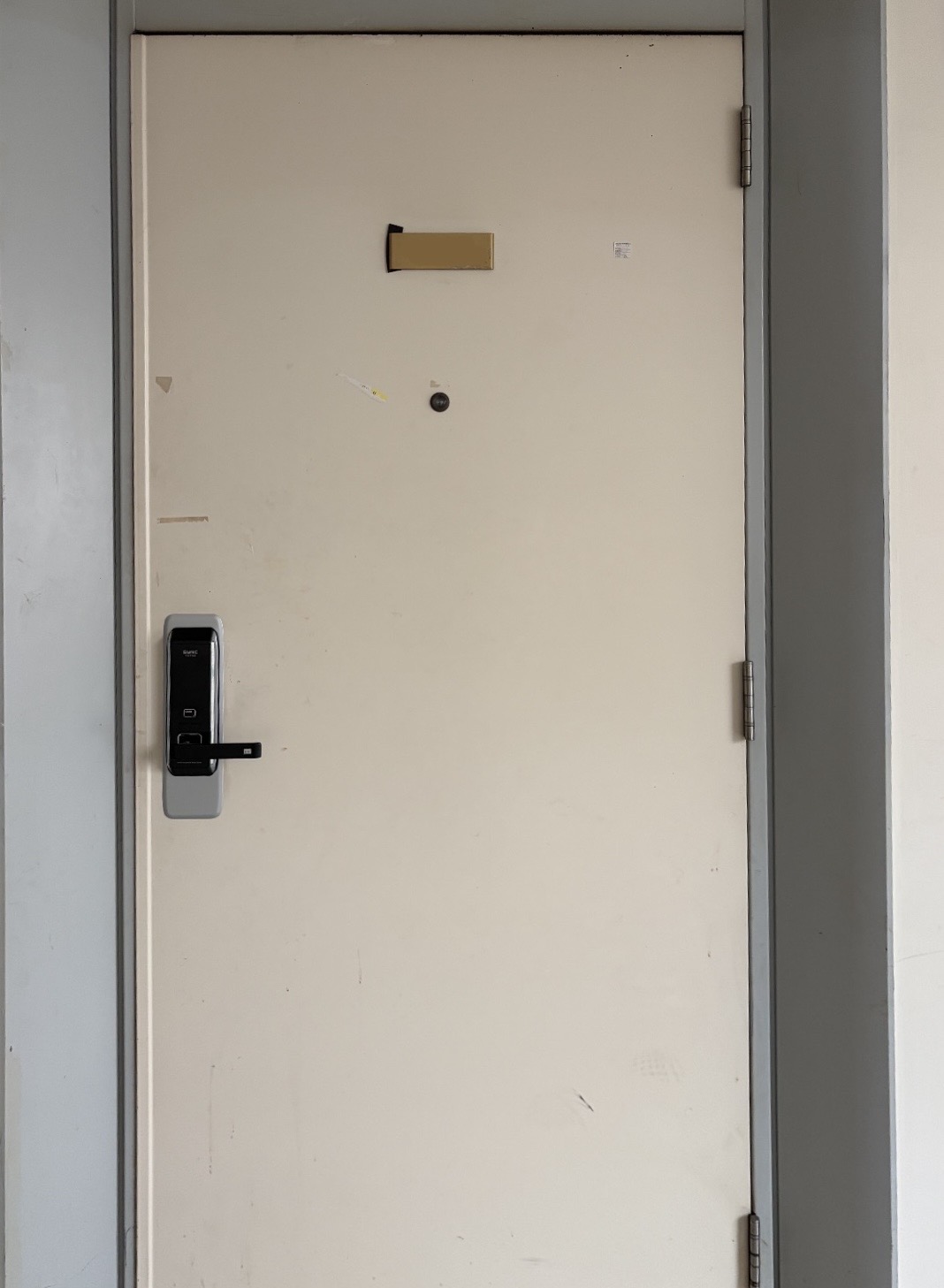 Room door with keypad lock